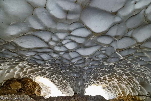 Inside the cave of summer snow